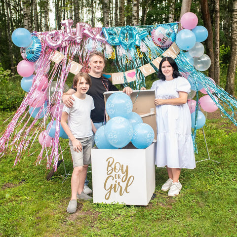 Family celebrating with Epic Gender Reveal Fire Extinguisher 2 Pack Color Powder Blaster With Biodegradable Smoke for party.