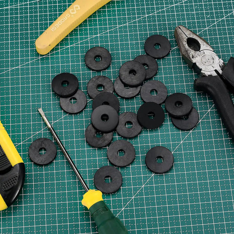 110 Piece Rubber Flat Washer Kit Tough As Nails Heavy Duty One Inch Outer Diameter Quarter Inch Inner Diameter Eighth Inch Thick Black Fender Washers Grommets And Spacers For Bolts And Screws on grid mat with tools