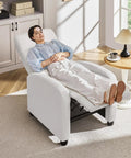 Person relaxing on Boucle Laidback Cozy Recliner Sofa With Push Back Design Adjustable Modern Single Recliner Chair Upholstered Pocket