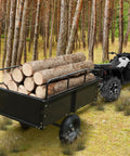 Dump Cart For Yard Work With 15 Cu Ft Steel Utility Trailer Removable Sides Foot Operated Dump And All Terrain Tires Tow Behind 1600 Lb Capacity For ATVs UTVs Lawn Mowers And Garden Projects Red loaded with logs in a forest