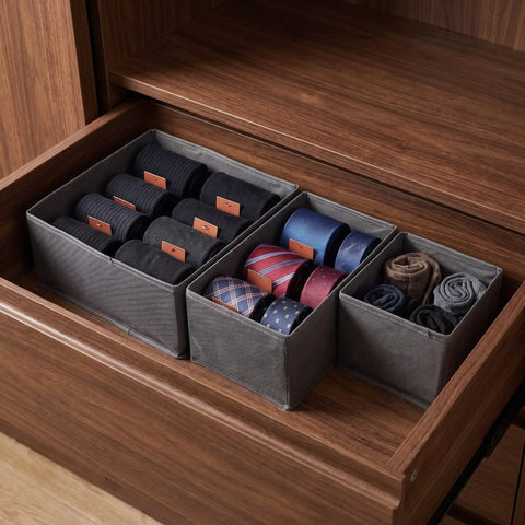 Super Sturdy Foldable Drawer Clothing Organizer Set Eight Piece Gray Fabric Wardrobe Dividers sorting ties and socks in a drawer.