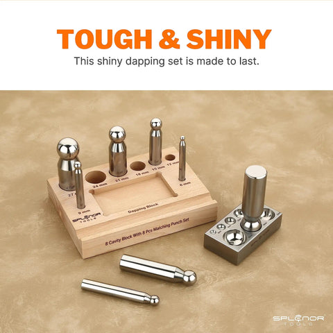 Heavy Duty Steel 8 Hole Dapping Block And 8 Matching Punch Set on wooden stand with size marked handles