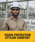 Industrial worker wearing Trim-Fit Half Frame Safety Eyewear For Unisex Outdoor Work And Play, black frame, clear lenses.
