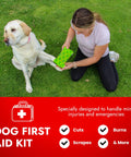 Woman using Cat And Dog First Aid Kit For Home And Travel With Thermometer Wound Care Supplies Bandages Antiseptic Essentials In A Medium Travel Bag Vet Designed For Emergencies on a dog outdoors.