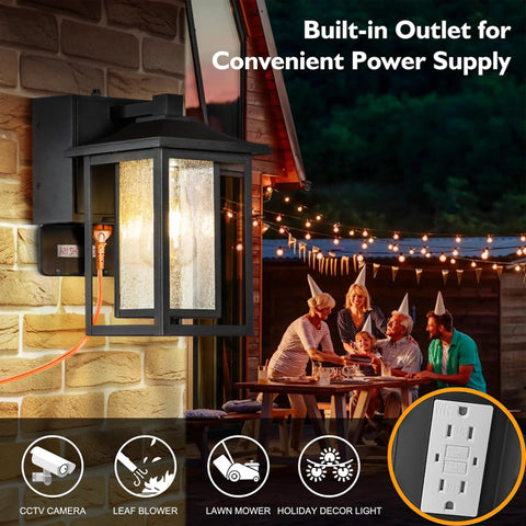 Black Exterior Wall Light With Dusk To Dawn Sensor And Seeded Glass For Front Porch Patio Or Garden, 1 Light Outdoor Fixture shown lit above a family gathering.