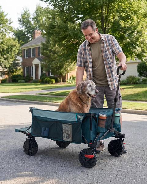 Man using Beast Wagon 600L Folding Utility Wagon with dog inside, showcasing extra wide 26 inch wheels for all terrain use.