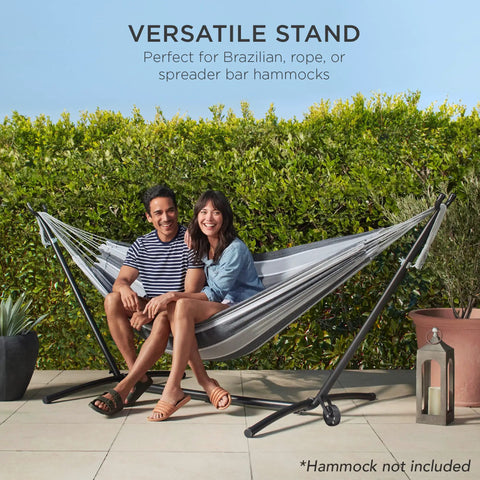 Heavy Duty 9 Foot Steel Hammock Stand With Built In Wheel For Easy Mobility Carrying Case Weather Resistant Finish And 450 Pound Capacity Your Go To Outdoor Yard Setup shown with hammock and seated people, greenery background