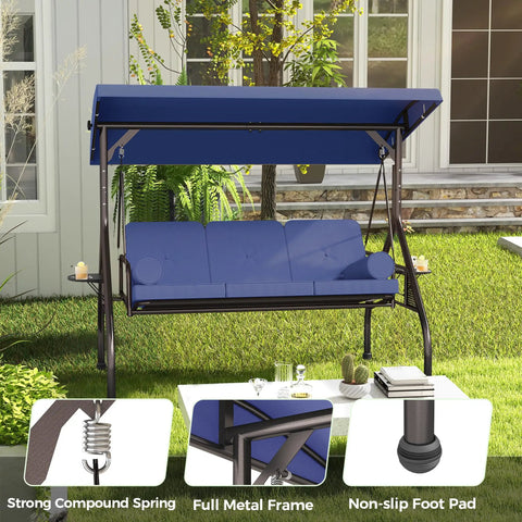 Three In One Outdoor Porch Swing Bed With Canopy Three Seat Patio Glider Cushioned Swing in Dark Blue with cup holders and pillows.