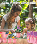 Mother and child using Pink Kids Gardening Tools Set With Rake Shovel Trowel Watering Can Gloves Apron Tote Bag for garden play.