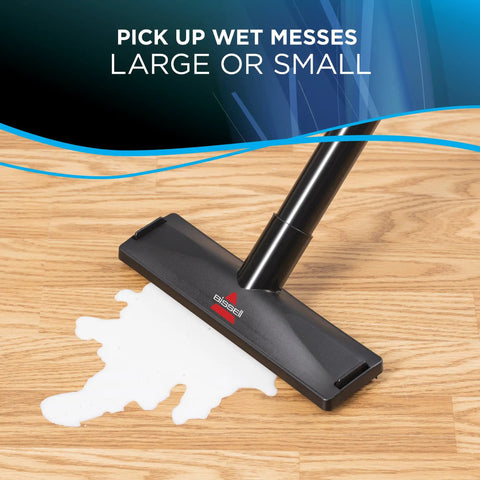 Power Clean Wet Dry Garage Vacuum Cleaner With 11 Amp Motor And 6 Gallon Capacity tool picking up wet mess on wood floor