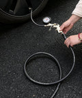Built Tough Kink Free Air Hose 1/4 Inch By 50 Feet 300 Psi being used for tire inflation with pressure gauge.