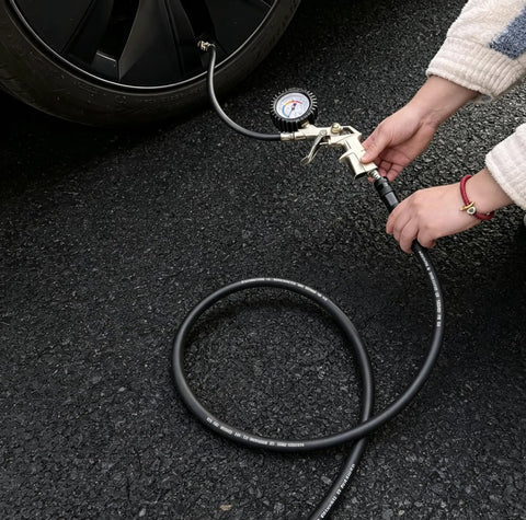 Built Tough Kink Free Air Hose 1/4 Inch By 50 Feet 300 Psi being used for tire inflation with pressure gauge.