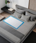 Super Absorbent Disposable Underpads And Incontinence Bed Pads 23 X 36 Inch on a bed, designed to protect against moisture.