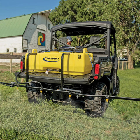 65 Gallon UTV Sprayer With 7 Nozzle Folding Boom 140 Inch Spray Width 4 GPM 12V Diaphragm Pump on UTV in pasture