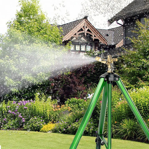 Heavy-Duty Impact Sprinkler On Tripod Base With Zinc Rotary Head For Lawn Yard And Garden, 360-Degree Coverage in use