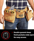 Heavy Duty Tool Belt For Men With 12 Pockets Pouch Utility Bag Suede Leather Work Apron For Electricians Carpenters Framers Construction Gear Built Tough And Ready For Any Job displayed on model with tools visible, highlighting double gussets for wide open front pockets.