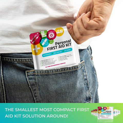 Side view of Amazon Personal First Aid Kit mini in jeans pocket; white package with colorful medical icons.