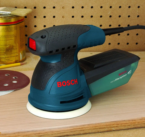 5 Inch Palm Random Orbit Sander Polisher With Two Point Five Amp 120 Volt Motor 12000 OPM Pad Dampening Brake in workshop