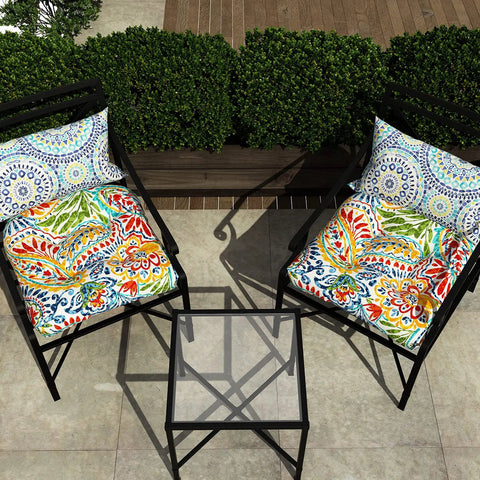 Outdoor setup with All Weather Tufted Wicker Chair Cushions Set Of 2 For Outdoor Patio Or Indoor Use, 19 Inch By 19 Inch By 4 Inch, Paisley design.