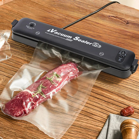 Single-Ply Vacuum Sealer Bags 6x10 Inch Quart Size used in food storage with a cut of meat inside, wood table background
