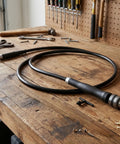 Flexible Drive Drill Bit Extension Flex Shaft Rotary Tool Accessory Fits 3 8 Inch Chucks on a workbench.