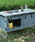 Foldable Camping Table With Storage, Ultra Portable Kitchen Table with cookware and snacks on grass, lightweight and 3 height adjustable