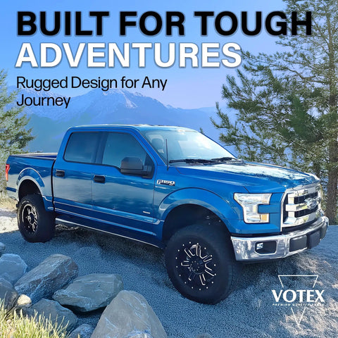 Blue truck on rocky terrain with clear sky, showcasing 13 Inch All Terrain Flexible Rubber Antenna With Spring Steel Internal Core.
