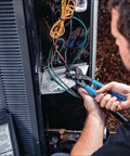 Person using Versatile 10 Inch Tongue And Groove Pliers With Straight Jaw For Plumbing, Automotive And Home Repair on electrical panel