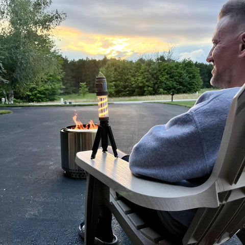 Outdoor Mosquito Bug Repellent Lantern With USB C Rechargeable Camping Light Citronella Mats on chair with sunset view