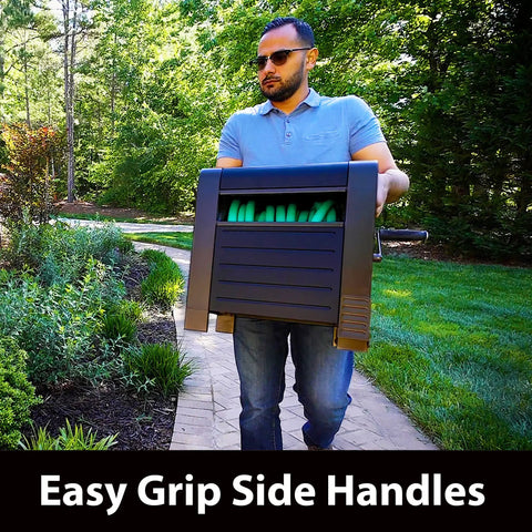 Person carrying Beefy 200 Foot Hose Storage Box With Internal Poly-Resin Reel in garden, Easy Grip Side Handles visible