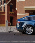 Heavy Duty Type 2 Ev Charger Cable 32 Amp 3 Phase 22 Kw Fast Charging Cord 5 Meter Length connected to an electric car at a charging station.