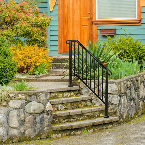 Heavy Duty Wrought Iron Handrails For Outdoor Steps on stone steps, solid black metal railing providing stability.