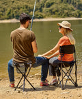 People sitting on Extra Large Quick Folding Tripod Stool With Backrest For Fishing And Camping Built Tough at a lakeside