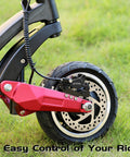 DYISLAND LD-210S hydraulic disc brake kit installed on front electric scooter wheel; black caliper, red arm, drilled rotor