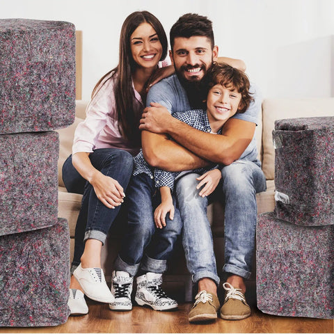 Family with 32 Piece Bulk Moving Blankets 54 By 72 Inch Heavy Duty Furniture Pads For Protecting Floors And Furniture During Moves Storage And Shipping Ideal Packing Blanket Set Brown Budget Friendly Easy To Use For Home Movers visible in the background