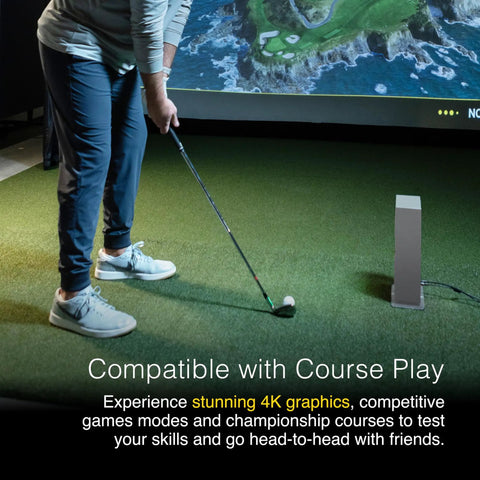 Person using Eye Mini Core Golf Launch Monitor And Simulator With Real Time Tracking And Near Zero Latency indoors.