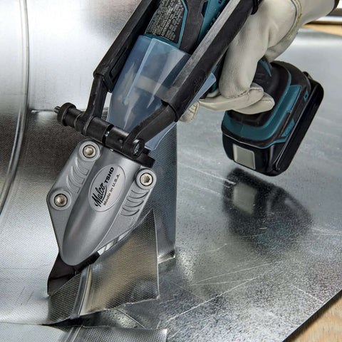 TSHD Turboshear Heavy Duty Metal Cutting Attachment for drills cutting galvanized steel, showing close-up view of the tool in use