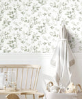 Room scene with Dancing Leaves Peel And Stick Wallpaper Green And White For A Quick Easy Wall Makeover No Glue Needed Removable And Repositionable Wall Covering Roll Twenty Point Five Inch Wide Eighteen Feet Long No Mess.