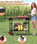 Foldable Grill Cart With Oversized Wheels For 17 To 22 Inch Grills, Ultimate Portable Outdoor BBQ Prep Table in use on grass
