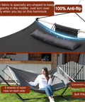 Anti Flip 12 Foot Hammock With Large 450 Pound Capacity Iron Spreader Bar And Nylon Rope in outdoor setting