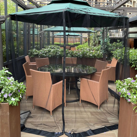 Universal Canopy Mosquito Net With Zipper Door And Adjustable Rope For Outdoor Umbrellas And Patio Tables Fits Seven Point Five To Eleven Feet Round Or Eight Foot Square Canopies Black installed on patio table.