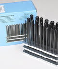 Steel Transfer Punch Set with Index Stand 28 Piece Pack, sizes 3/32 to 1/2 inch, displayed in a metal stand, box in background