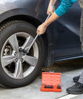 Mechanic using Six Piece Half Inch Drive Impact Socket Set For Any Job With Ten SAE And Metric Sizes on car wheel lug nuts