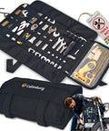Compact Roll Up Motorcycle Tool Bag With MOLLE Strap holding tools, unfolded and rolled, on a black background