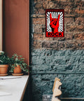Front view: Xanovir music tin sign on brick wall, red rock-hand logo and ROCK text.