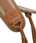Close-up of brown canvas bird game carrier with leather trim and waxed cord loops.