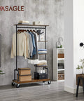 Smooth Rolling 5 Tier Clothes Rack With Industrial Pipe Frame And Rustic Brown Shelves For Organizing Wardrobe Essentials And Flexing Your Daily Fits At Home with clothes and accessories.