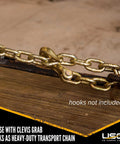 Top Shelf Grade 70 Chain 3 8 Inch By 400 Feet Heavy Duty Freight And Rigging Link with clevis grab hook on wooden surface.
