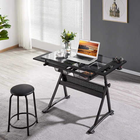 Adjustable Drafting Desk With Stool Multifunction Artist Table For Home Studio Tilting Glass Top Work Surface Diamond Painting Station Two Storage Drawers Heavy Duty Steel Frame Easy Height Adjust in modern room setting