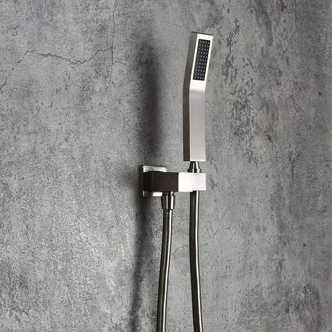 Heavy Duty Brushed Nickel Wall Mount Shower Combo Features A Square Ten Inch Ceiling Rain System And Handheld Spray Unit Crafted From Solid Brass For Knockout Water Pressure On Your Daily Grind - Close-up of handheld sprayer on wall